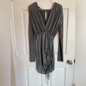 Silver dress with tie up bottom -Never been worn!